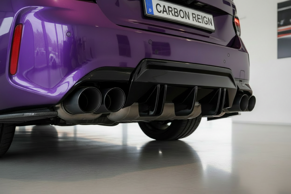 Close-up rear view of a purple sports car showing the exhaust system, diffuser, and a license plate reading 'CARBON REIGN' in a clean indoor showroom.